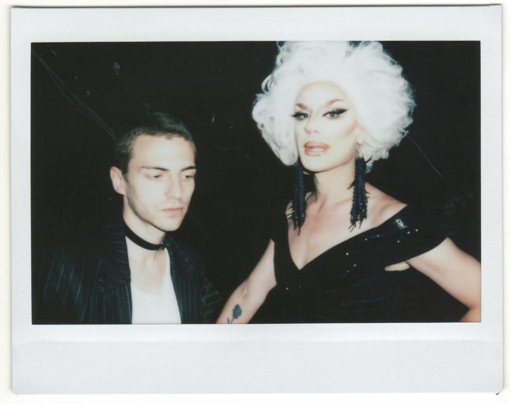 woman in black sleeveless dress